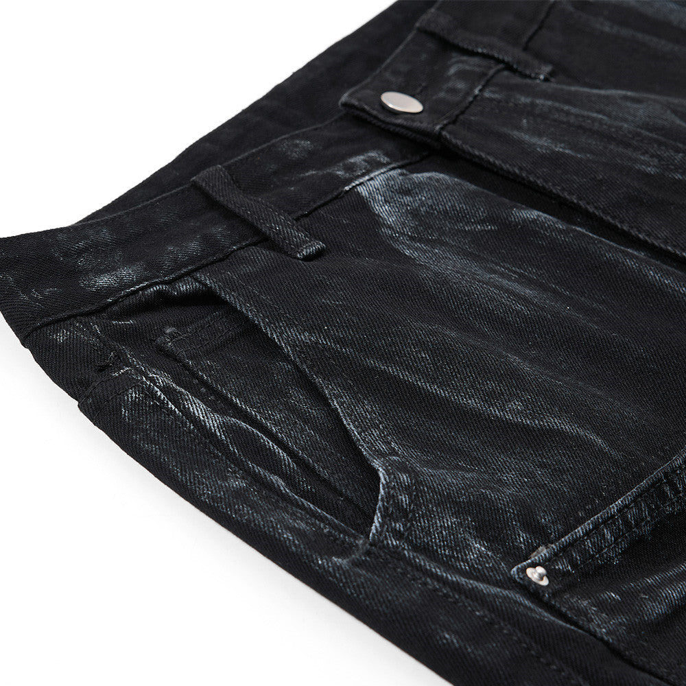 Graffiti splashed ink to make dirty denim bell bottoms