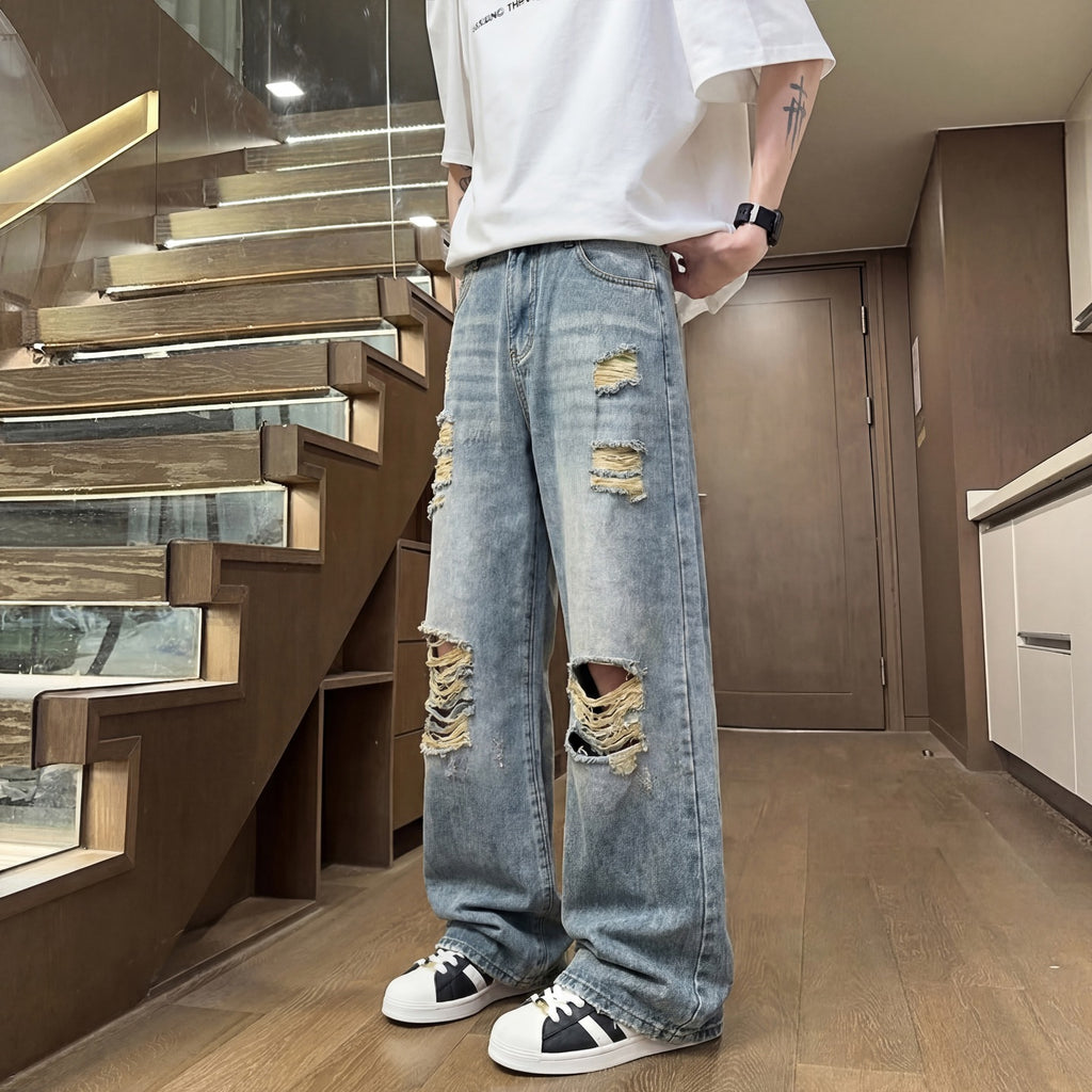 Light colored ripped jeans for men