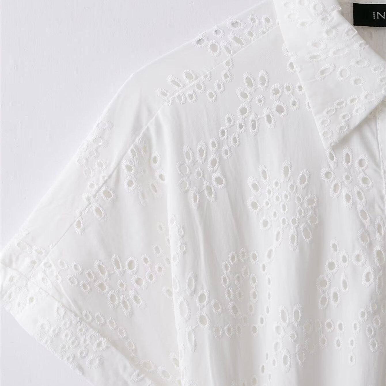 Elegant hollowed out embroidered dress