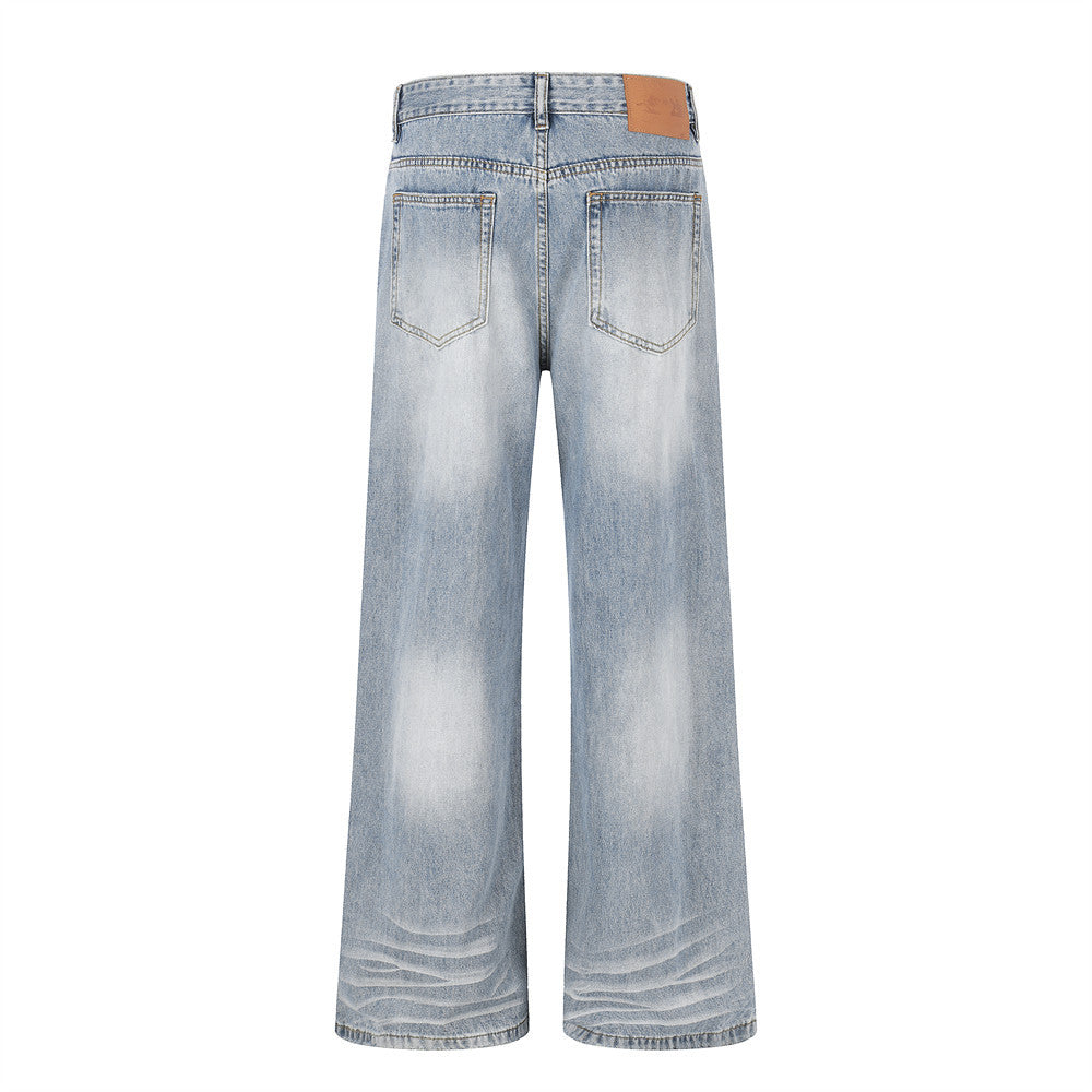 Light colored washed creased denim pants