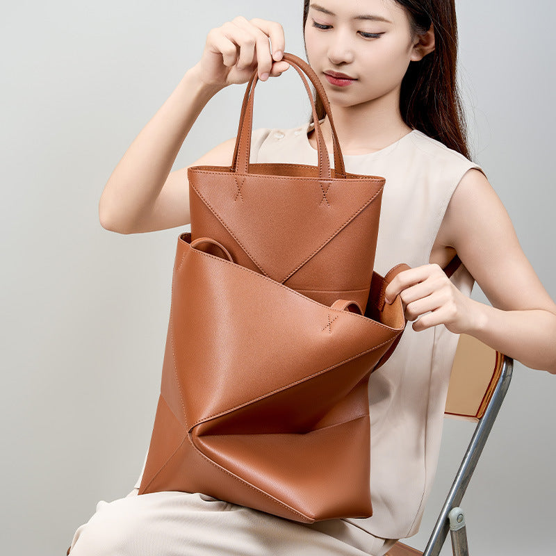 Large capacity single shoulder geometric splicing folding bucket bag