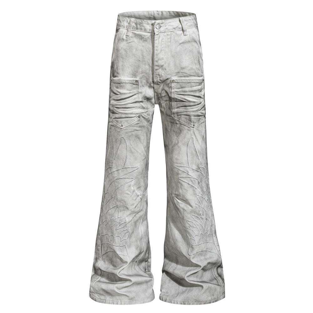 Graffiti splashed ink to make dirty denim bell bottoms