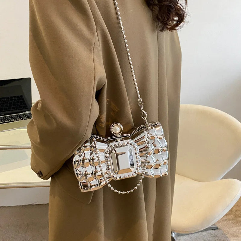 Luxury Acrylic Pvc Bow Shaped Lipstick Bag Creative Personality Mini Small Bag Fashion Metal Chain Crossbody Bag For Women