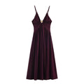 Backless accessory-decorated midi dress