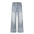 Light colored washed creased denim pants