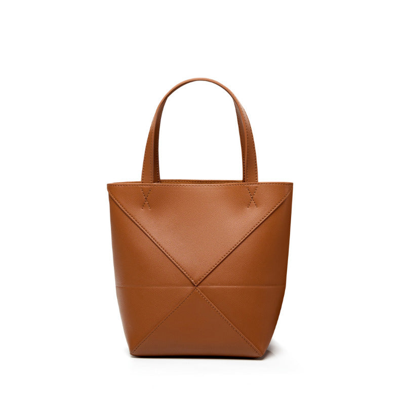 Large capacity single shoulder geometric splicing folding bucket bag