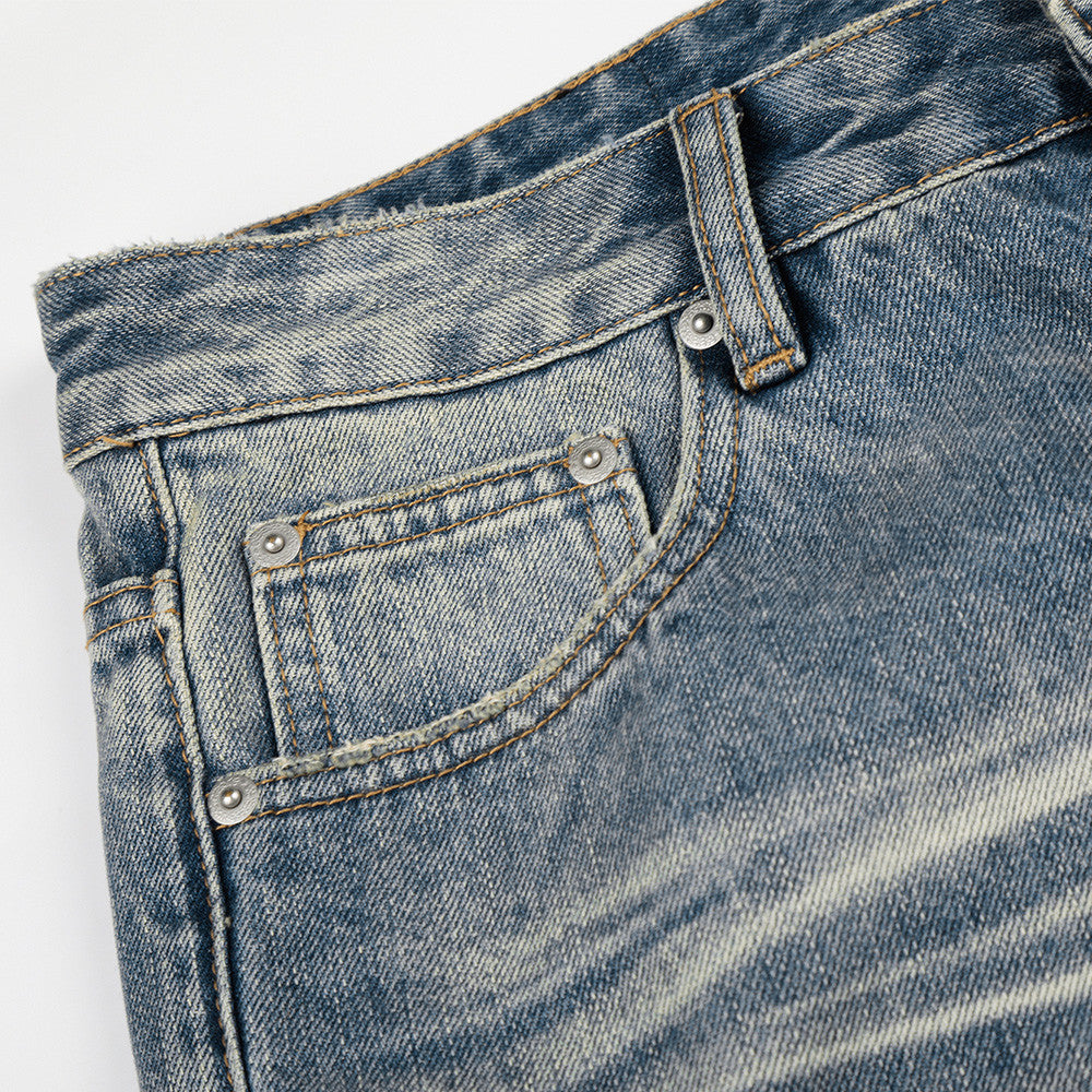 Whitewashed ripped denim micro pull pants