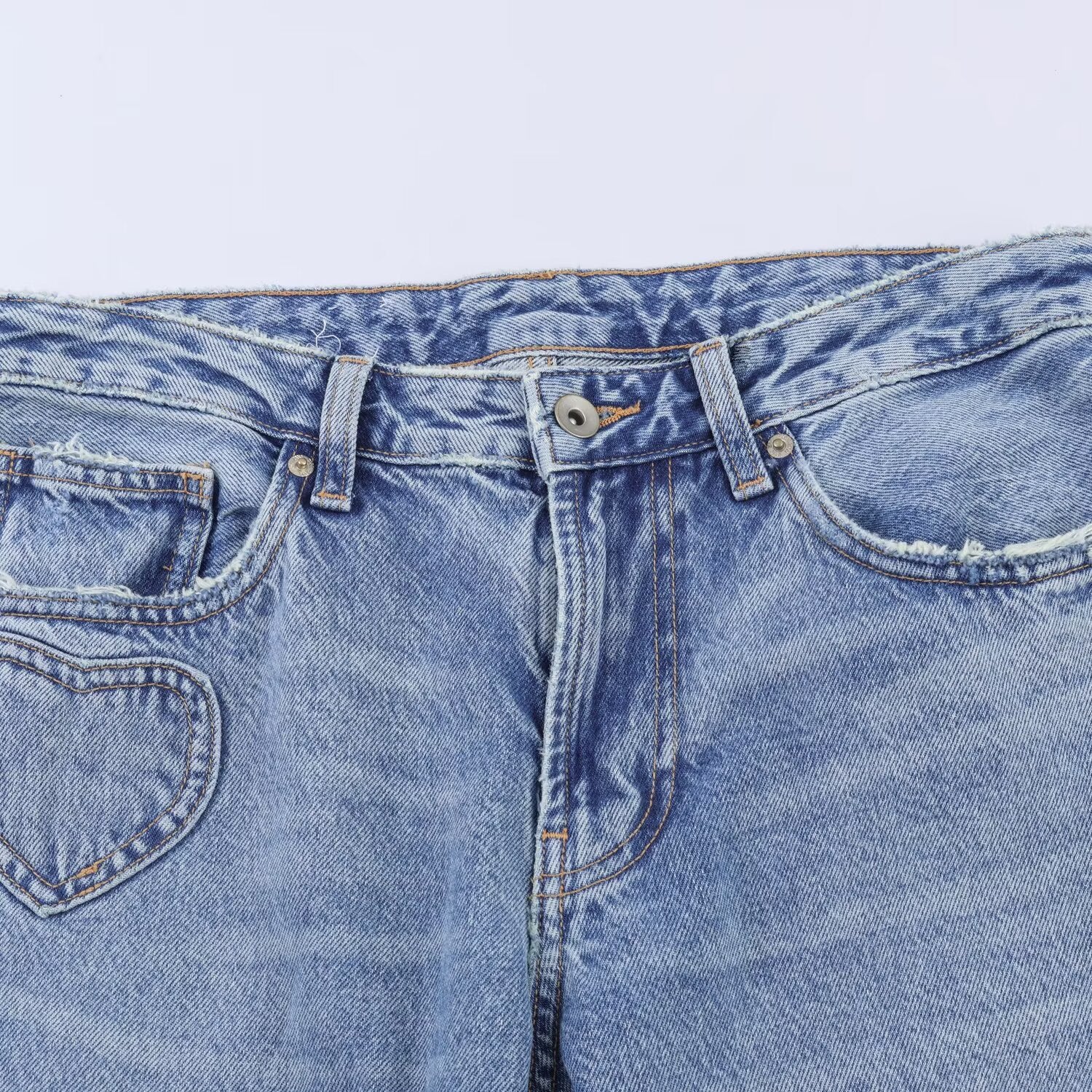 Retro heart-shaped ripped jeans