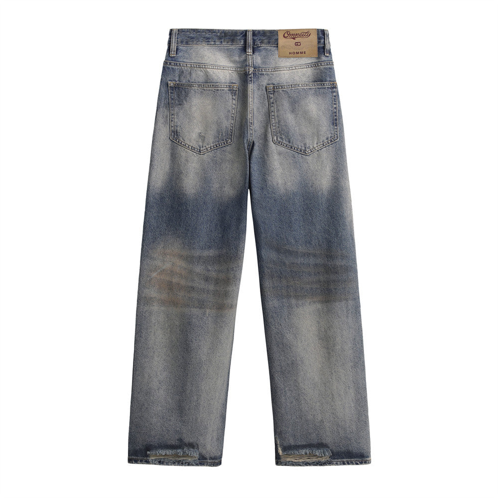 Ripped worn dirty straight leg jeans