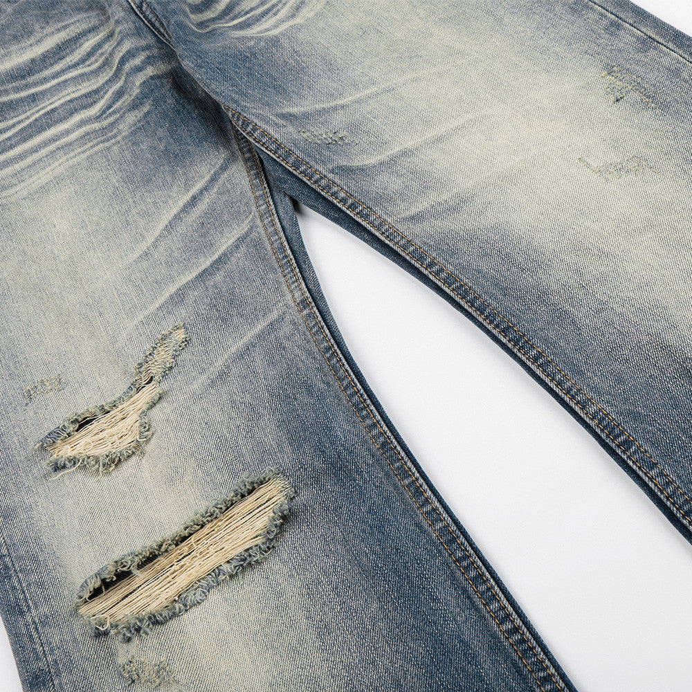Whitewashed ripped denim micro pull pants