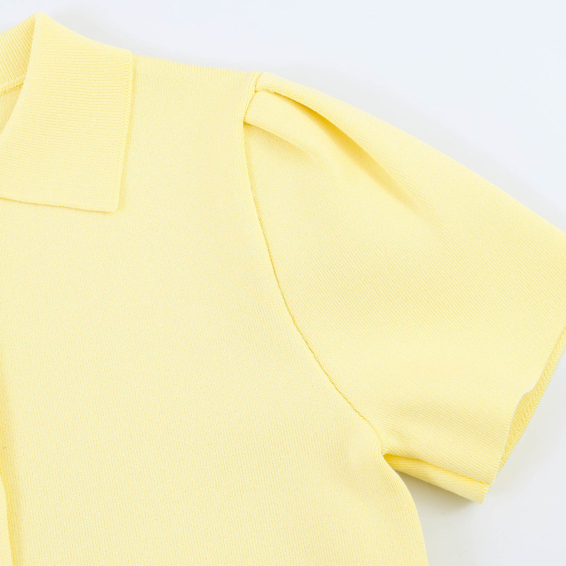 Bow embellished knitted short sleeved top