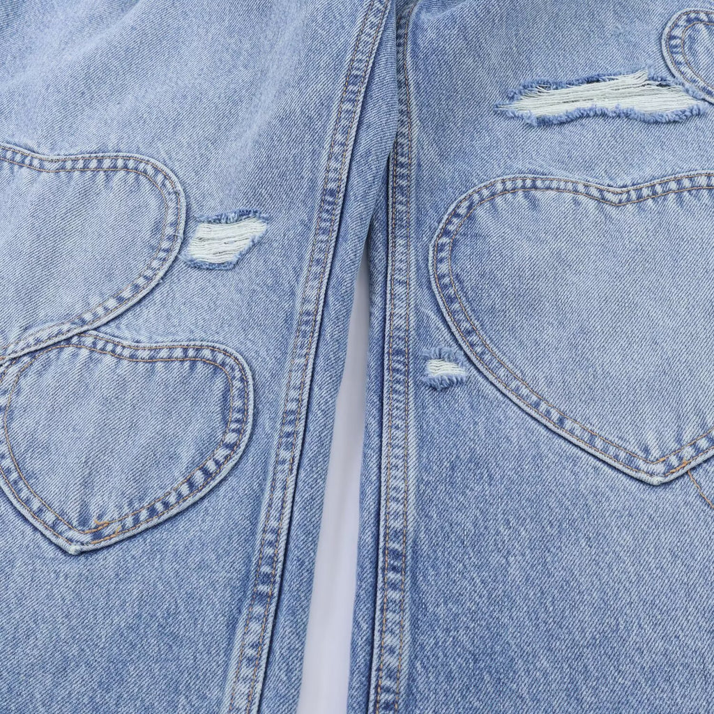 Retro heart-shaped ripped jeans