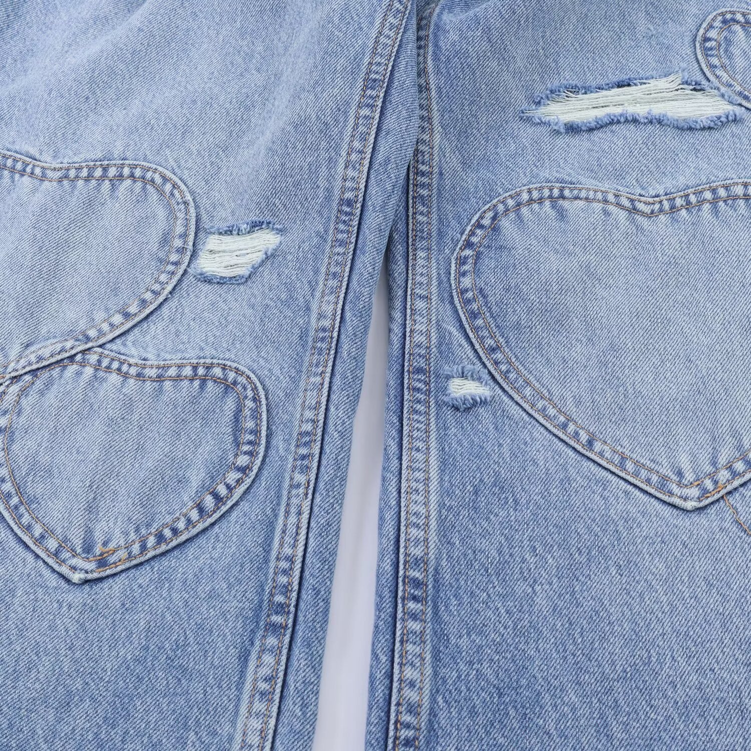 Retro heart-shaped ripped jeans