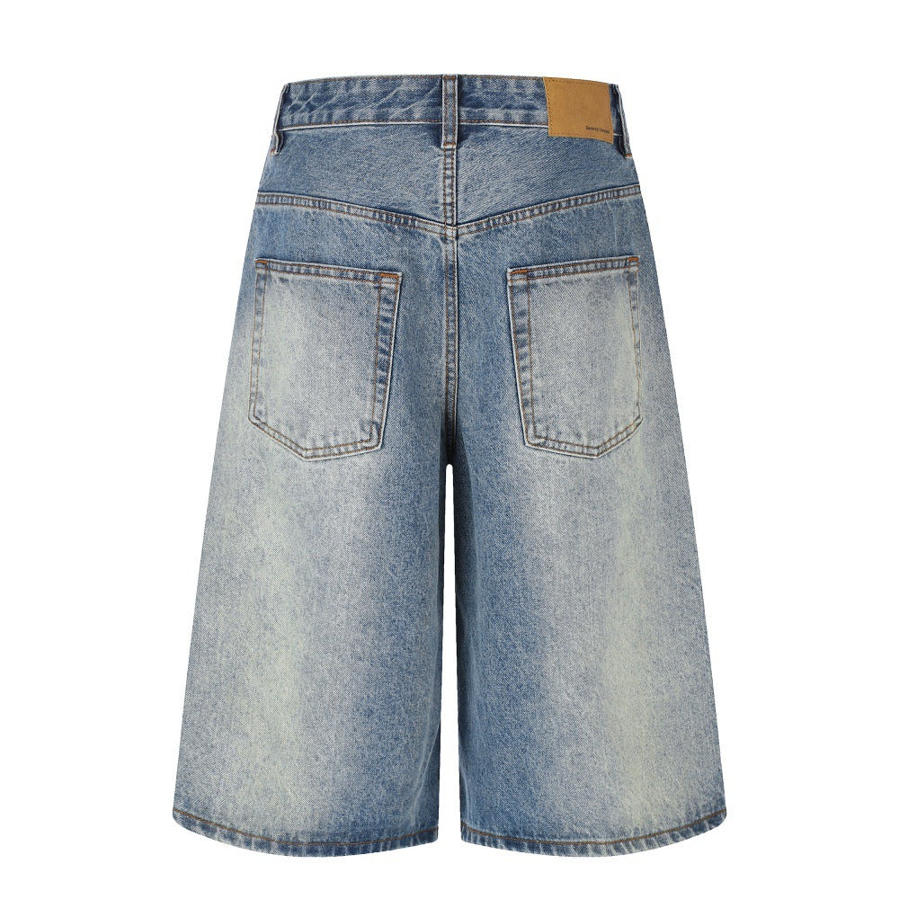 Used washed denim five quarter shorts