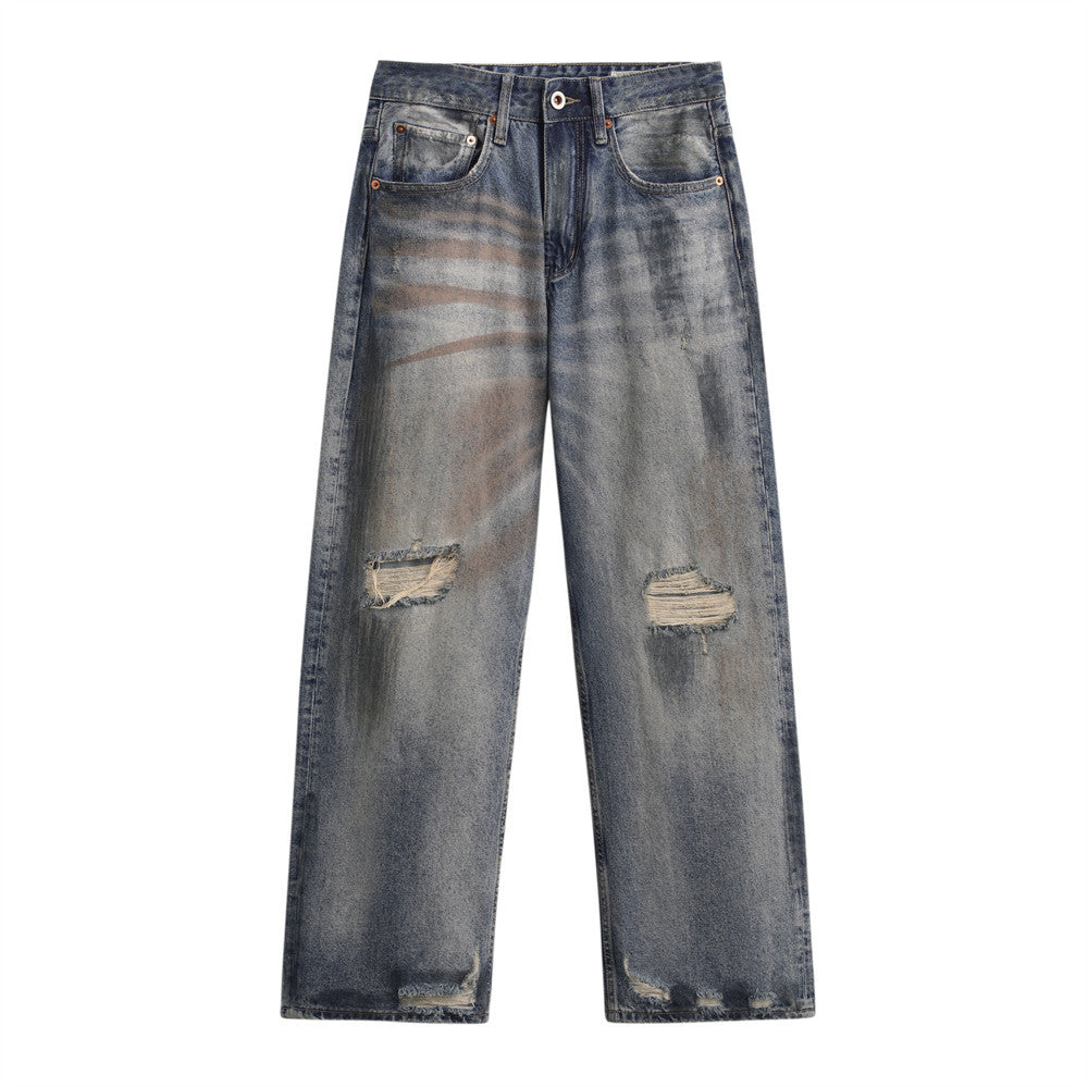 Ripped worn dirty straight leg jeans