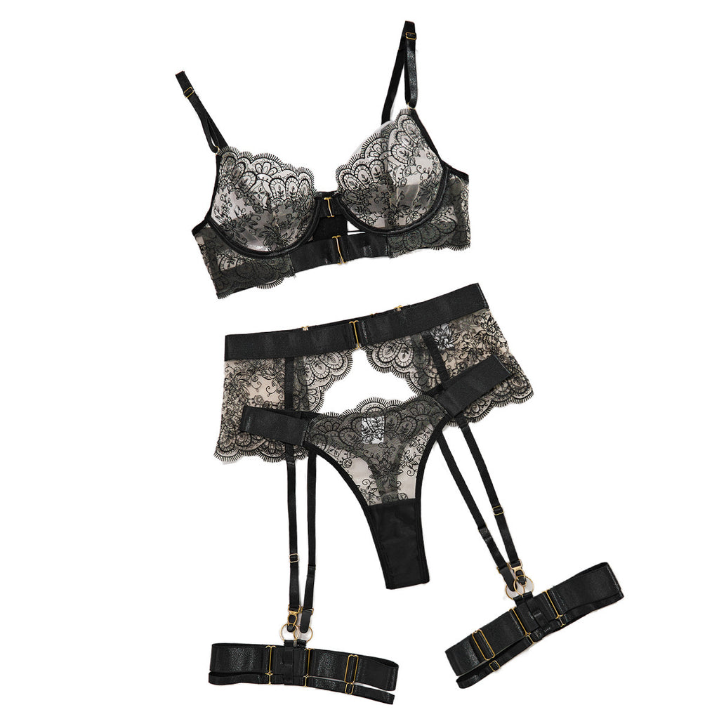 Women's four-piece shapewear set with sheer embroidered lace lingerie