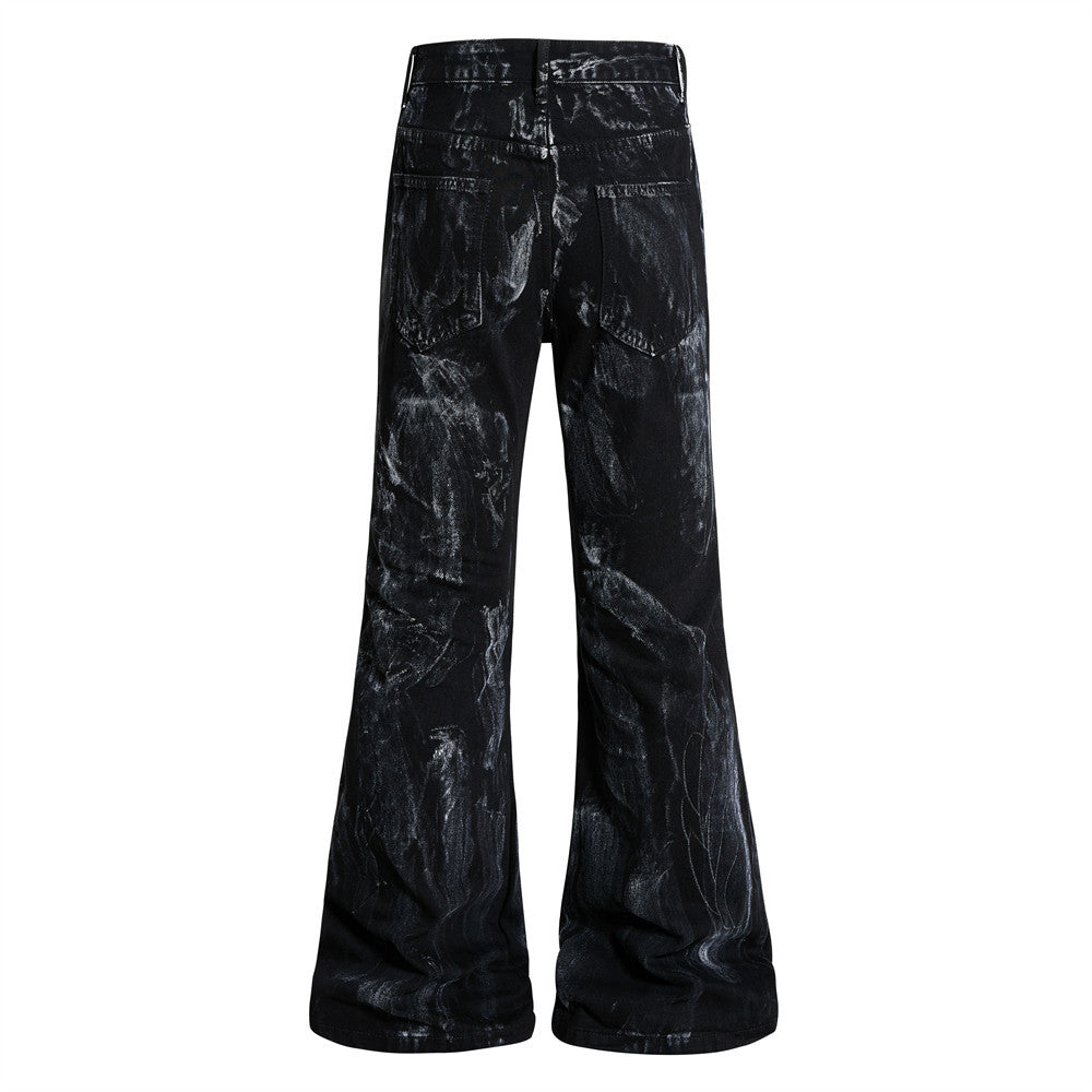 Graffiti splashed ink to make dirty denim bell bottoms
