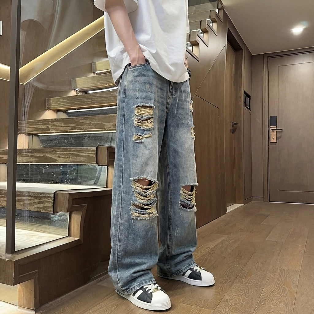 Light colored ripped jeans for men