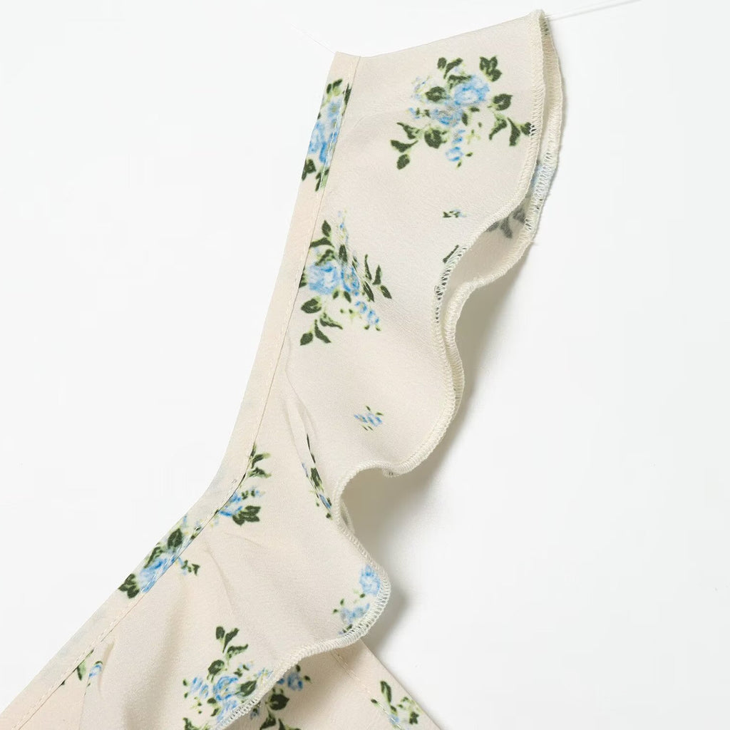 Holiday style floral ruffle edge sleeveless dress
