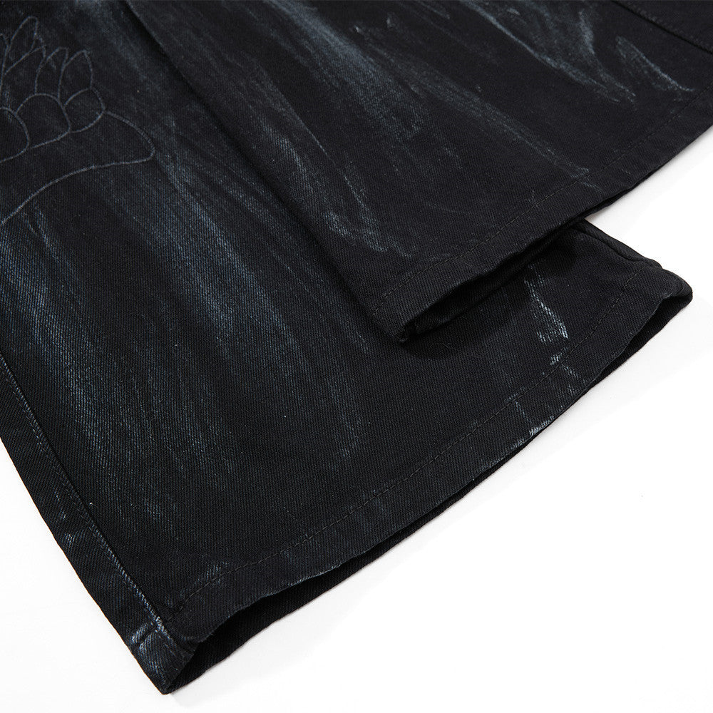 Graffiti splashed ink to make dirty denim bell bottoms